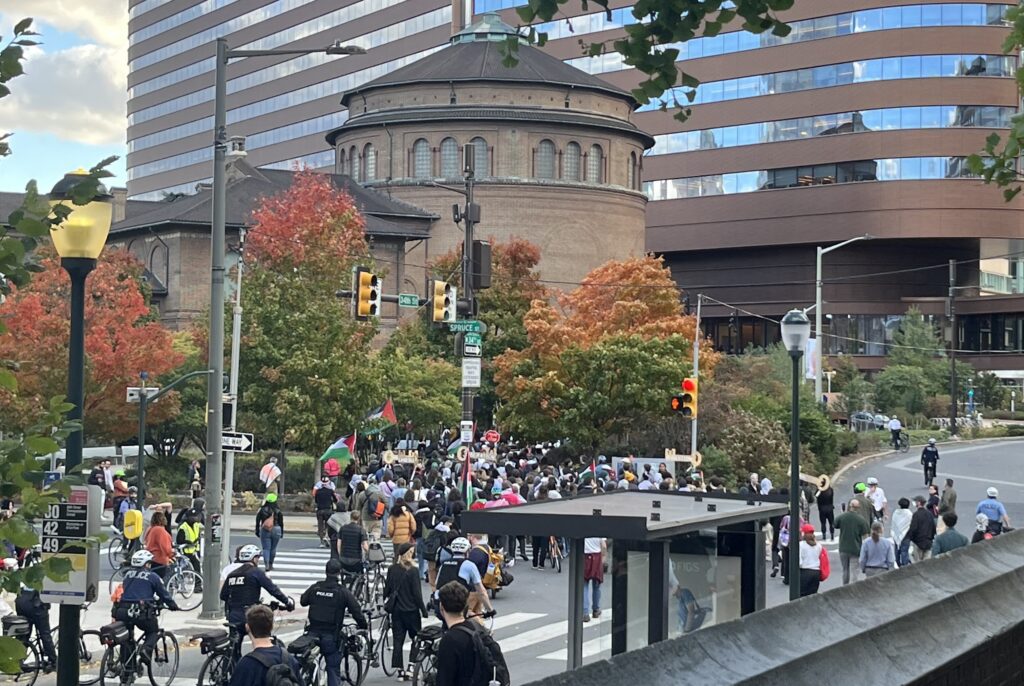 Photo credit: Sarah Mester / The protest  makes its way towards the Penn museum. 